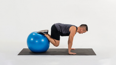 take-your-planks-to-the-next-level-with-the-stability-ball-knee-tuck